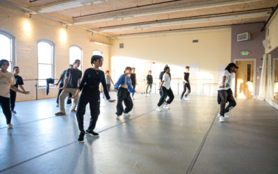 A group of students in a hip hop class