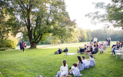 Audience watching a dance performance on the Chesterwood lawn