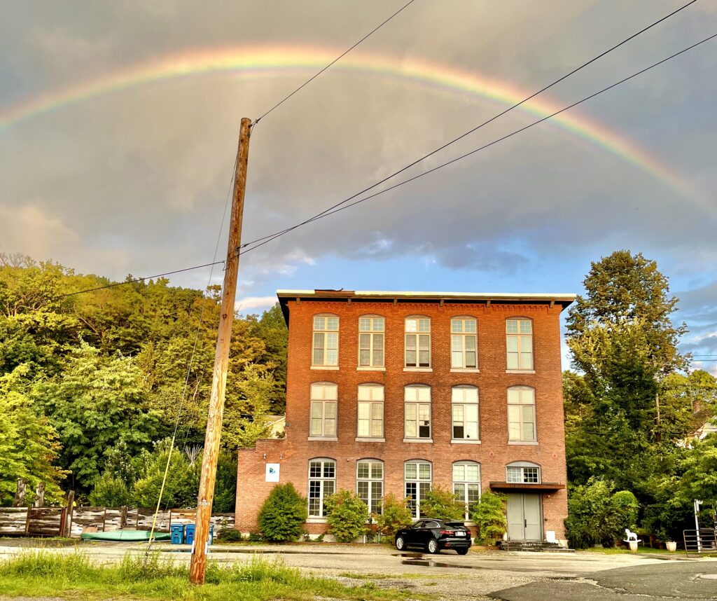 Picture of 410 Park Street with a rainbow above it